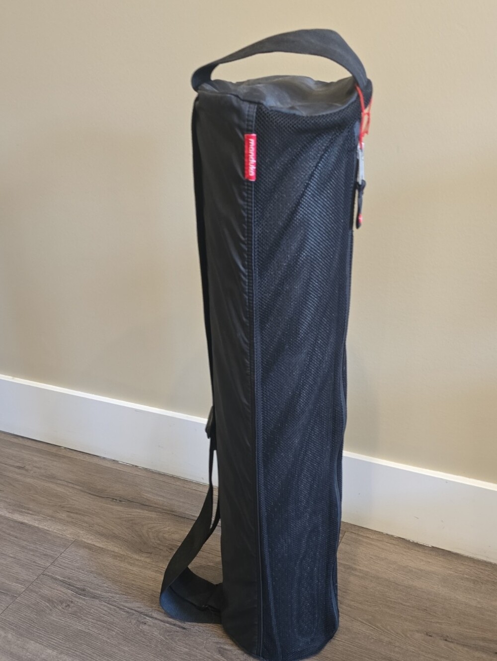 manduka Black Yoga Mat Carrier with Red Logo Tag